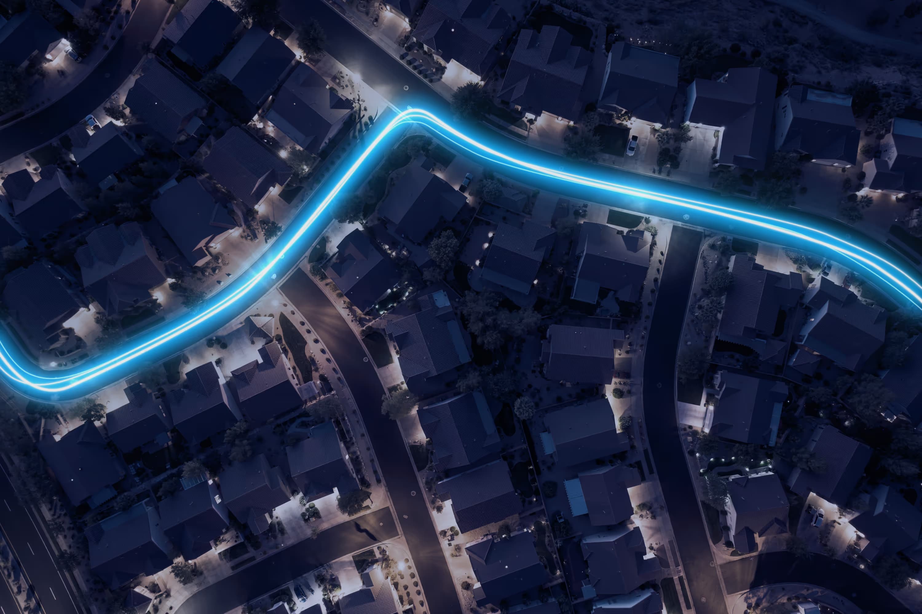 Aerial view of a neighborhood at dusk